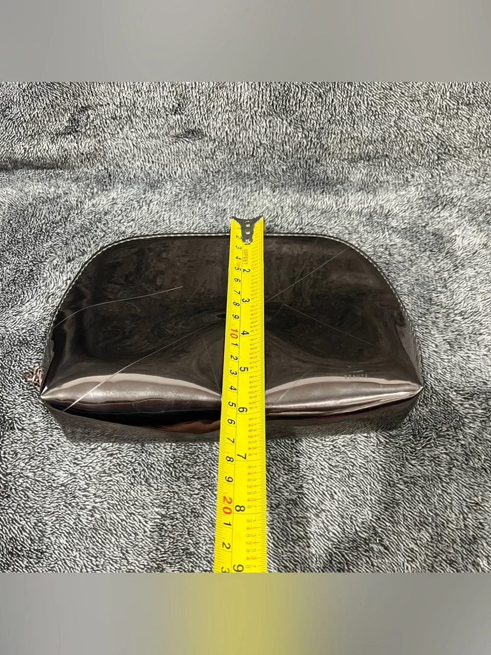 Yves Saint Laurent (YSL) metallic gunmetal cosmetic pouch